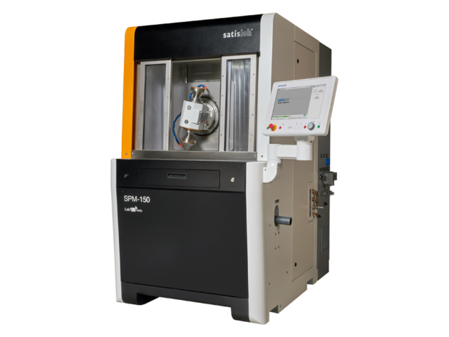 Frontal view of Satisloh SPM-150 grinding machine used in precision optics manufacturing.