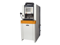 Frontal view of Satisloh SPM-10 grinding machine for micro optics used in precision optics manufacturing.