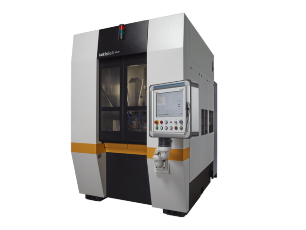 Frontal view of Satisloh GI grinding machine used in precision optics manufacturing.