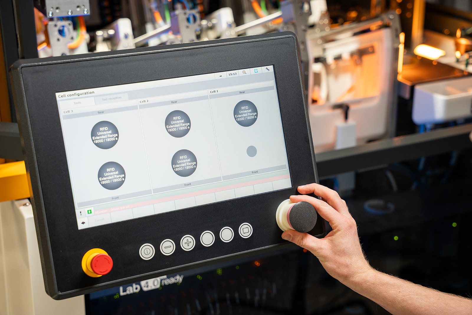 Satisloh NEO-Flex touchscreen control display close-up, providing an intuitive interface for monitoring and managing lens manufacturing processes.
