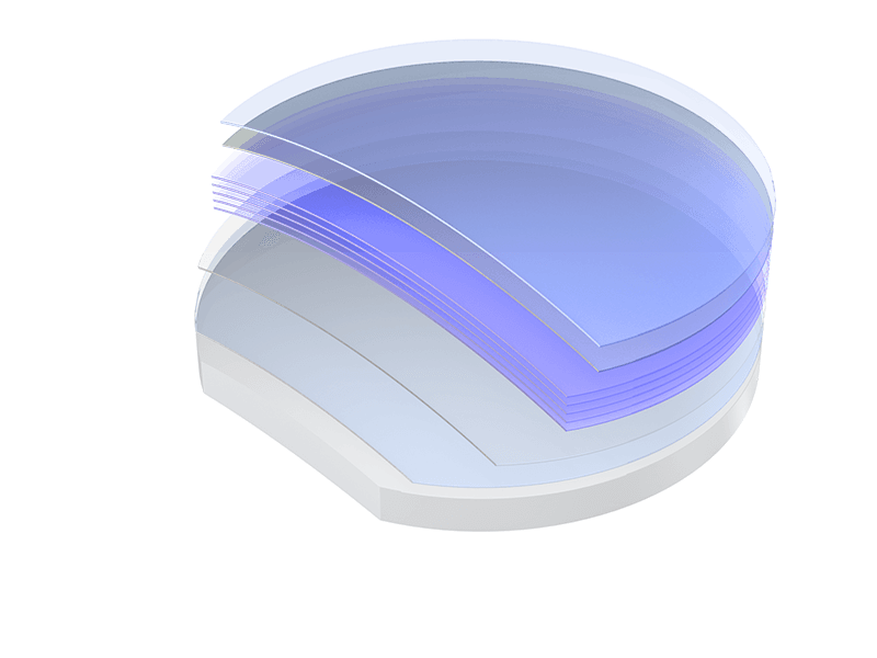 Stack of semiconductor wafers with blue-tinted reflective layers on top.