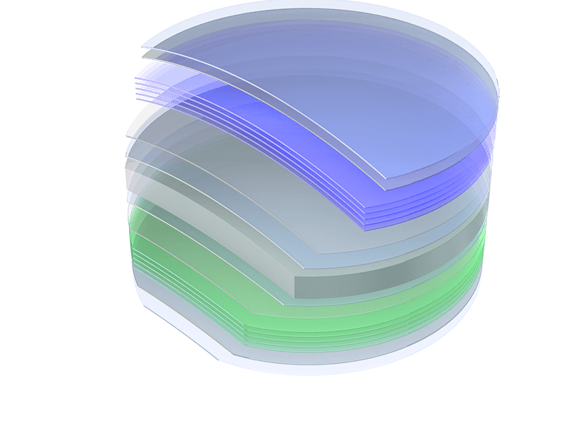 Stack of semiconductor wafers with blue and green-tinted protective layers reflecting light.